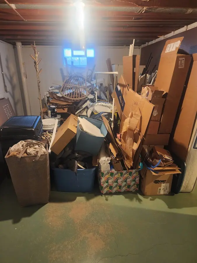 Roll-off dumpster container at job site for 4 Yard Dumpster Rental in Evergreen